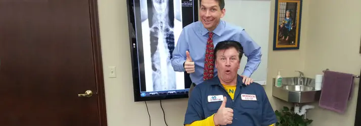 Chiropractor De Pere WI Nathan DeLorey and Happy Patient Chiropractor De Pere WI Nathan DeLorey and Happy Patient